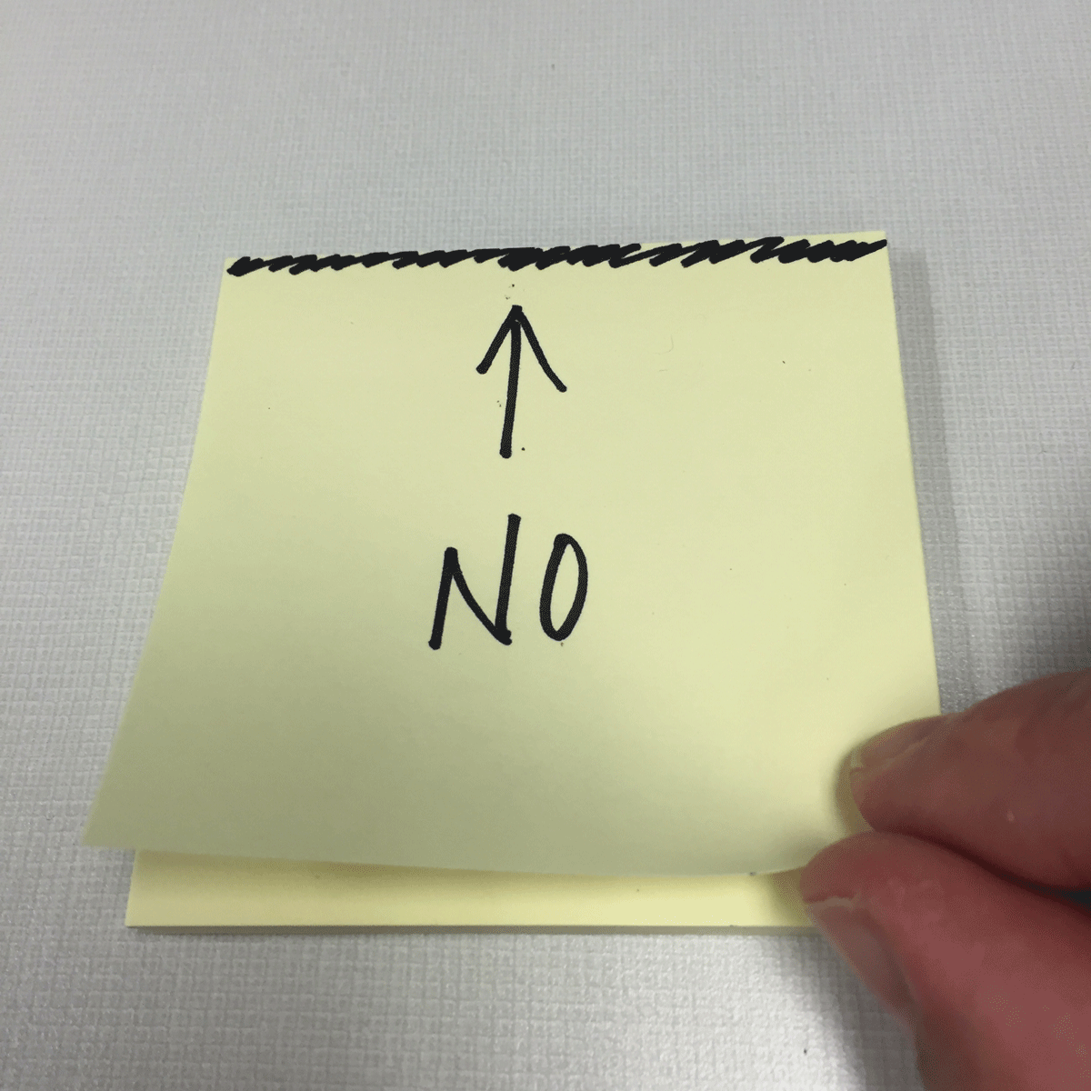 The wrong way to peel post-it notes